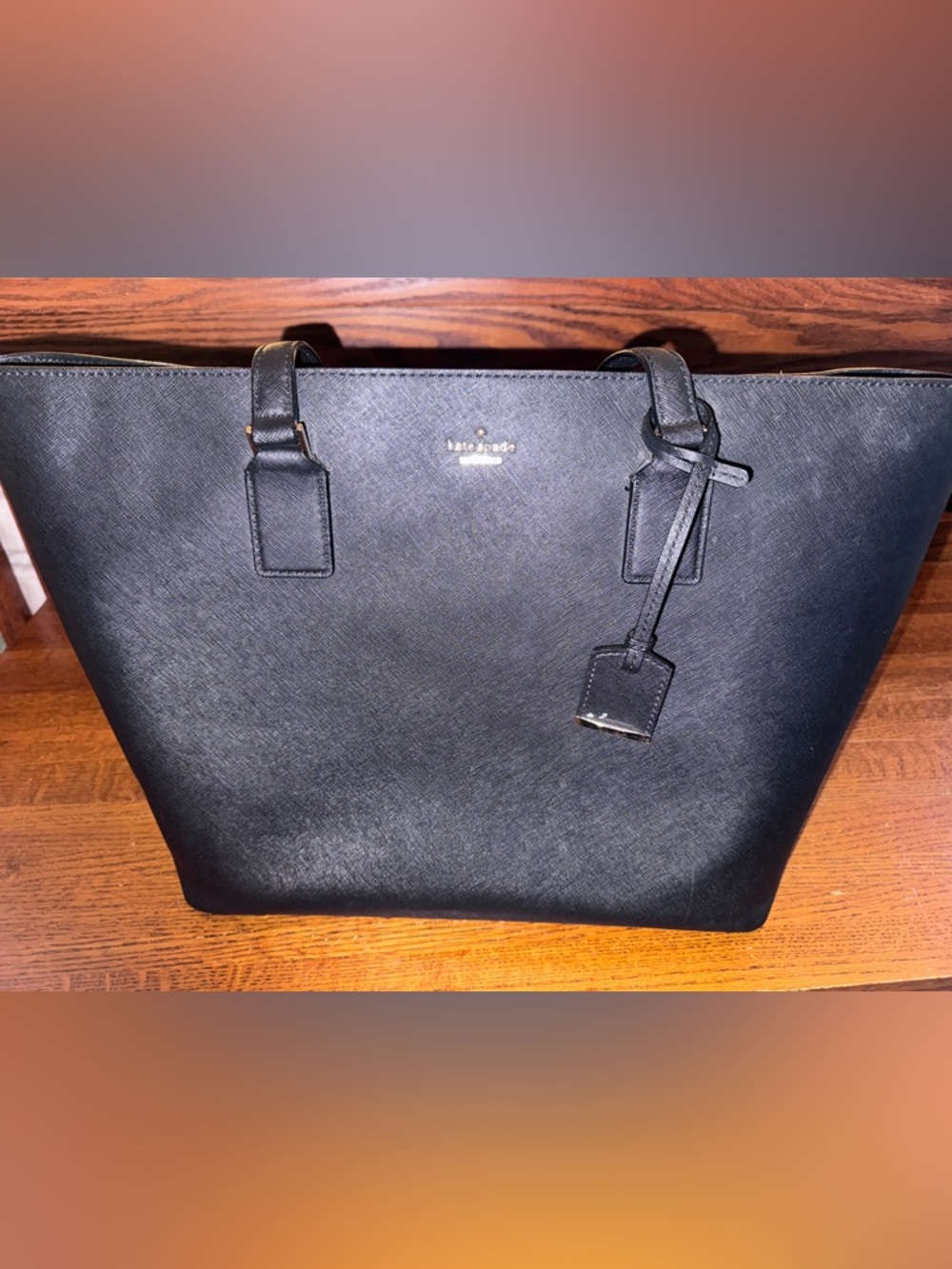 kate spade black saffiano tote with luggage tag